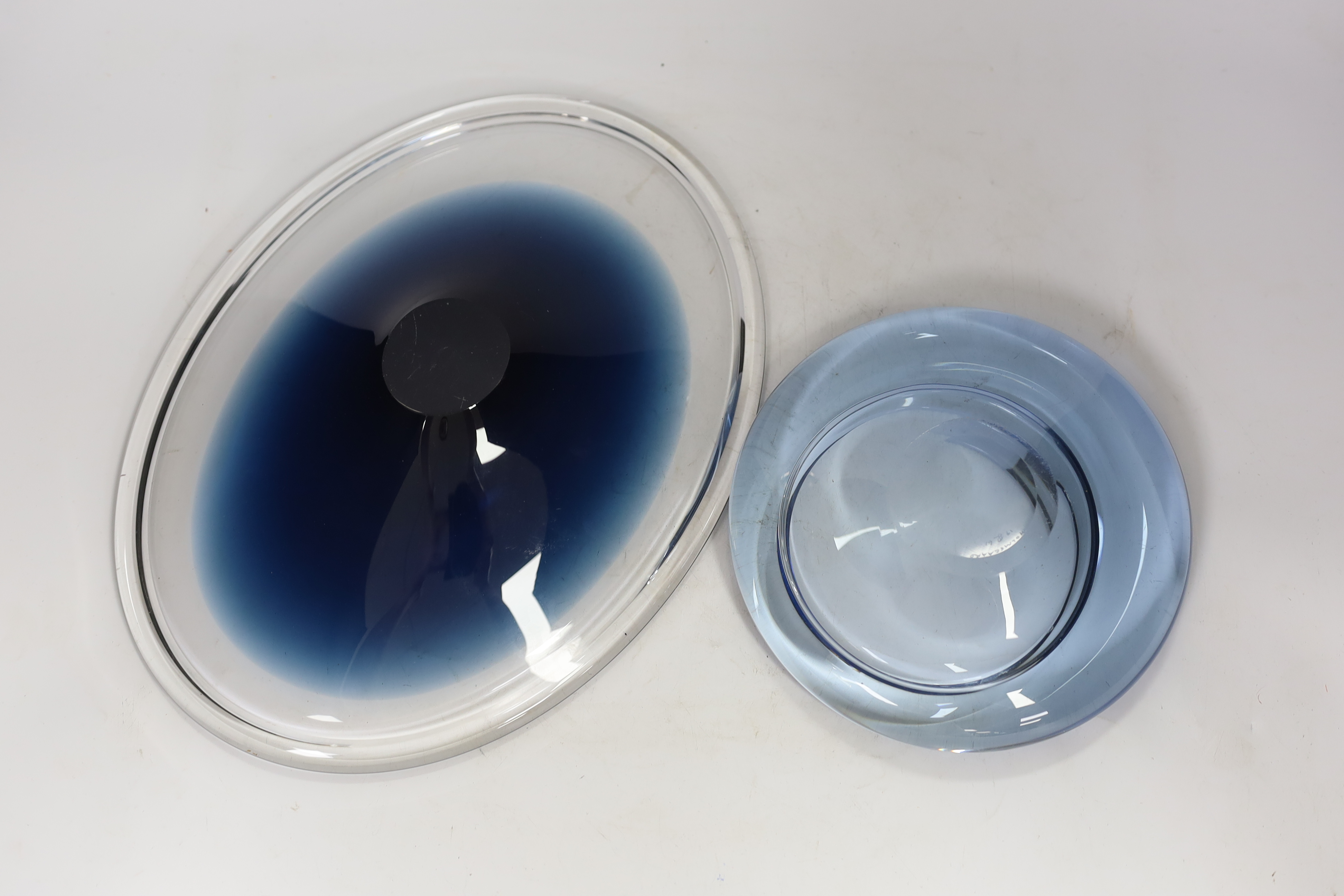 Two 1960's glass dishes, a Per Lutken for Holmegaard example and a Wedgwood example, both signed, largest 33.5cm